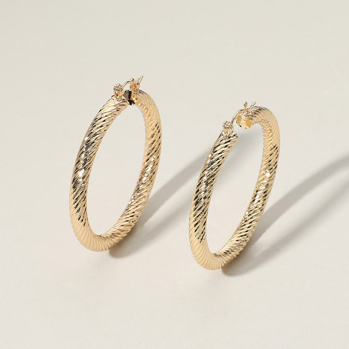 Twisted Metal Hoop Earrings - Gold